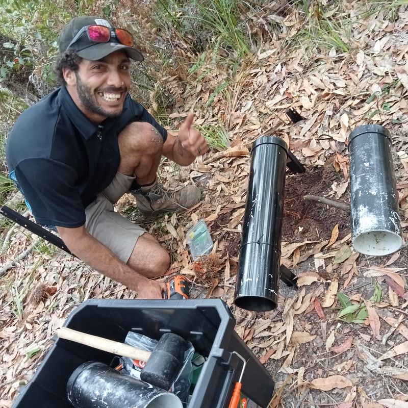 Ranger Brandon Green changing the feeders.