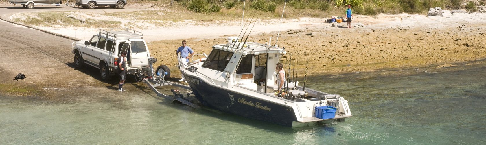 Launching a boat at Booderee